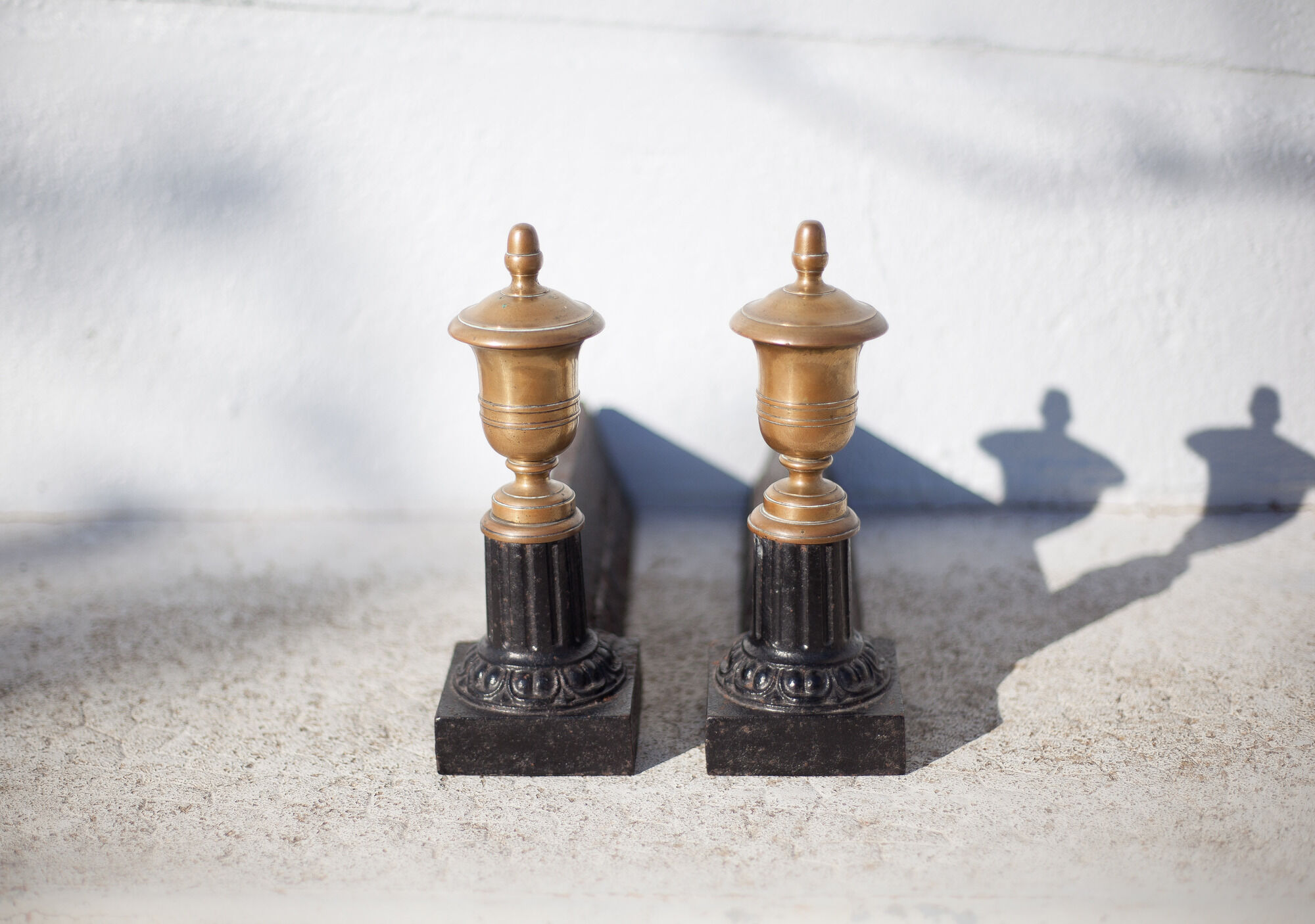 Cast iron and brass chenets