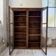 Glass-fronted walnut library 1900