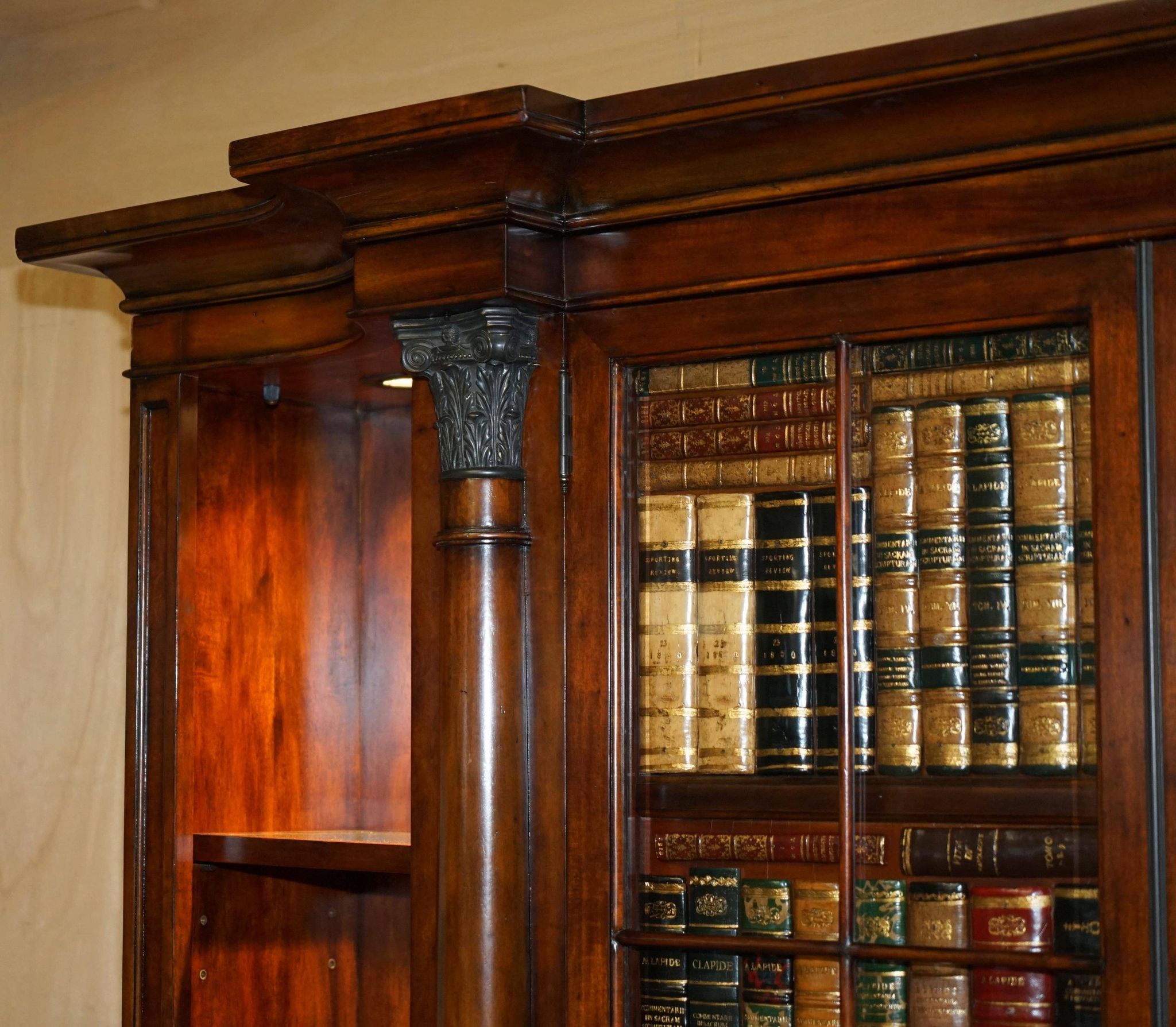 Theodore Alexander library in faux books in burl laurel.