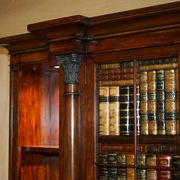 Theodore Alexander library in faux books in burl laurel.