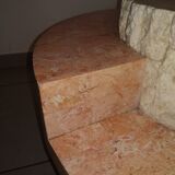 Round coffee table in fossil or mactan stone by Magnussen Ponte 1980