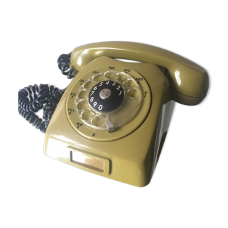 Vintage mustard green rotary telephone