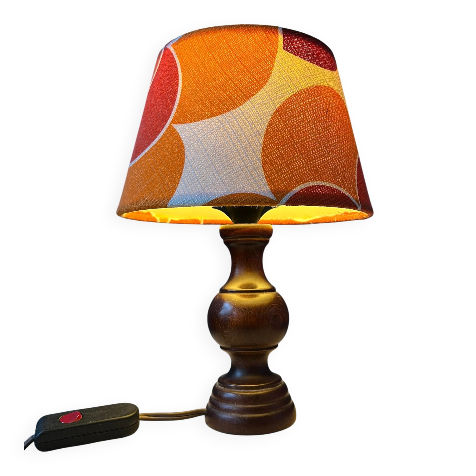 Vintage Space Age table lamp with orange fabric shade.