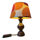 Vintage Space Age table lamp with orange fabric shade.