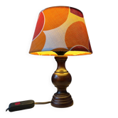 Vintage Space Age table lamp with orange fabric shade.
