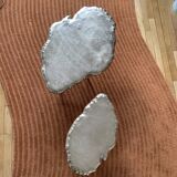 Set of two designer coffee tables in cast aluminum