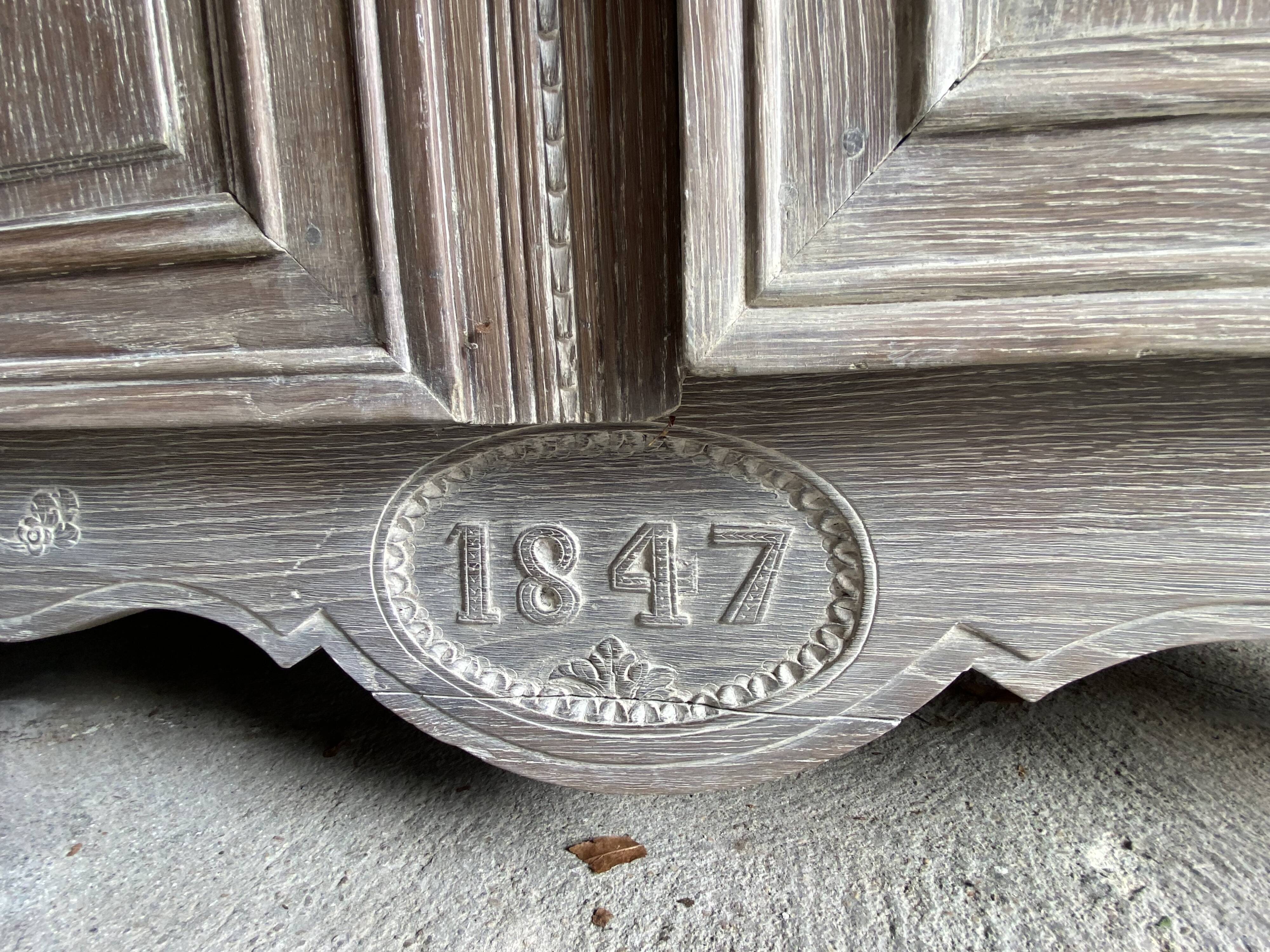 19th century limed oak wardrobe.