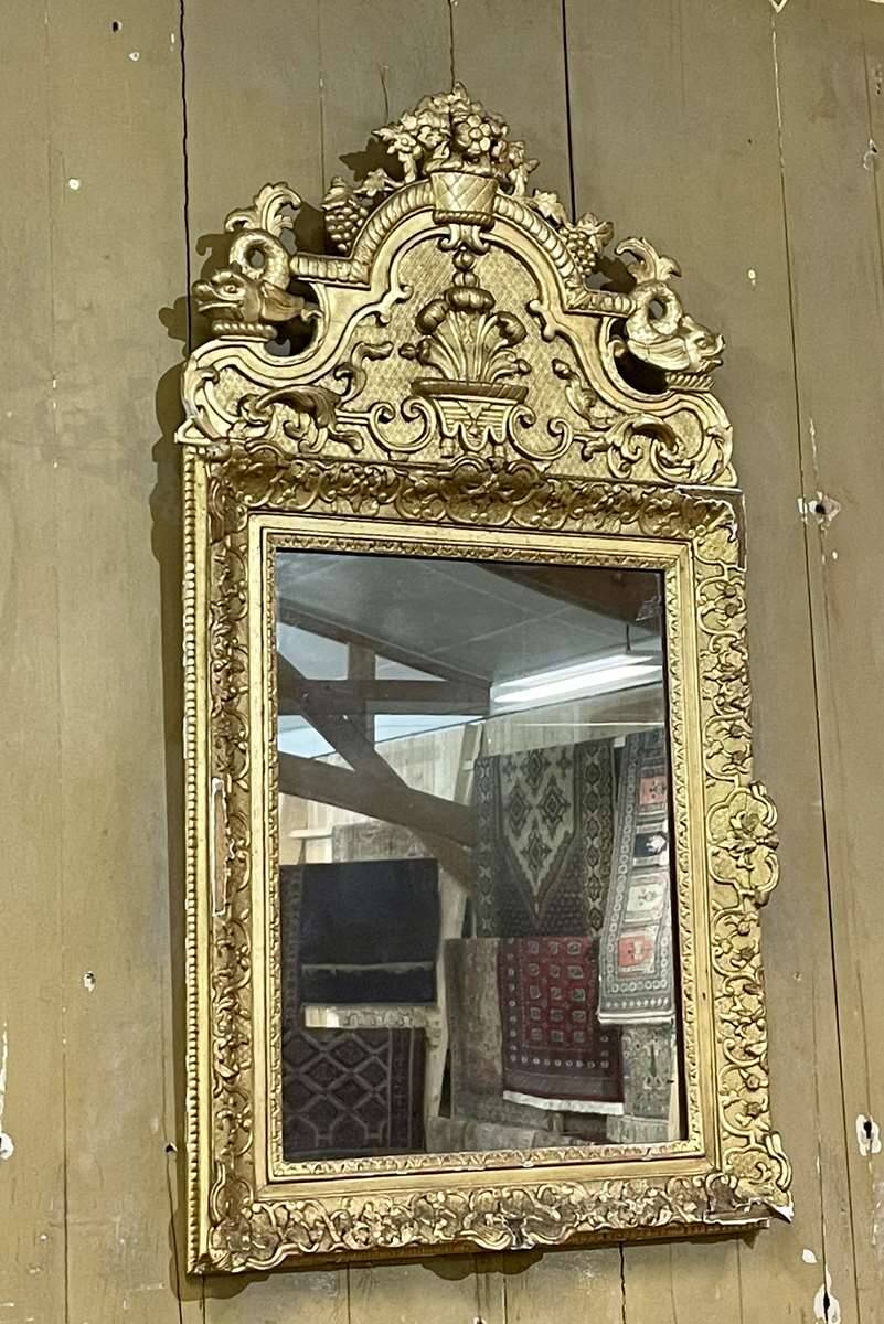 18th century Regency mirror in gilded wood