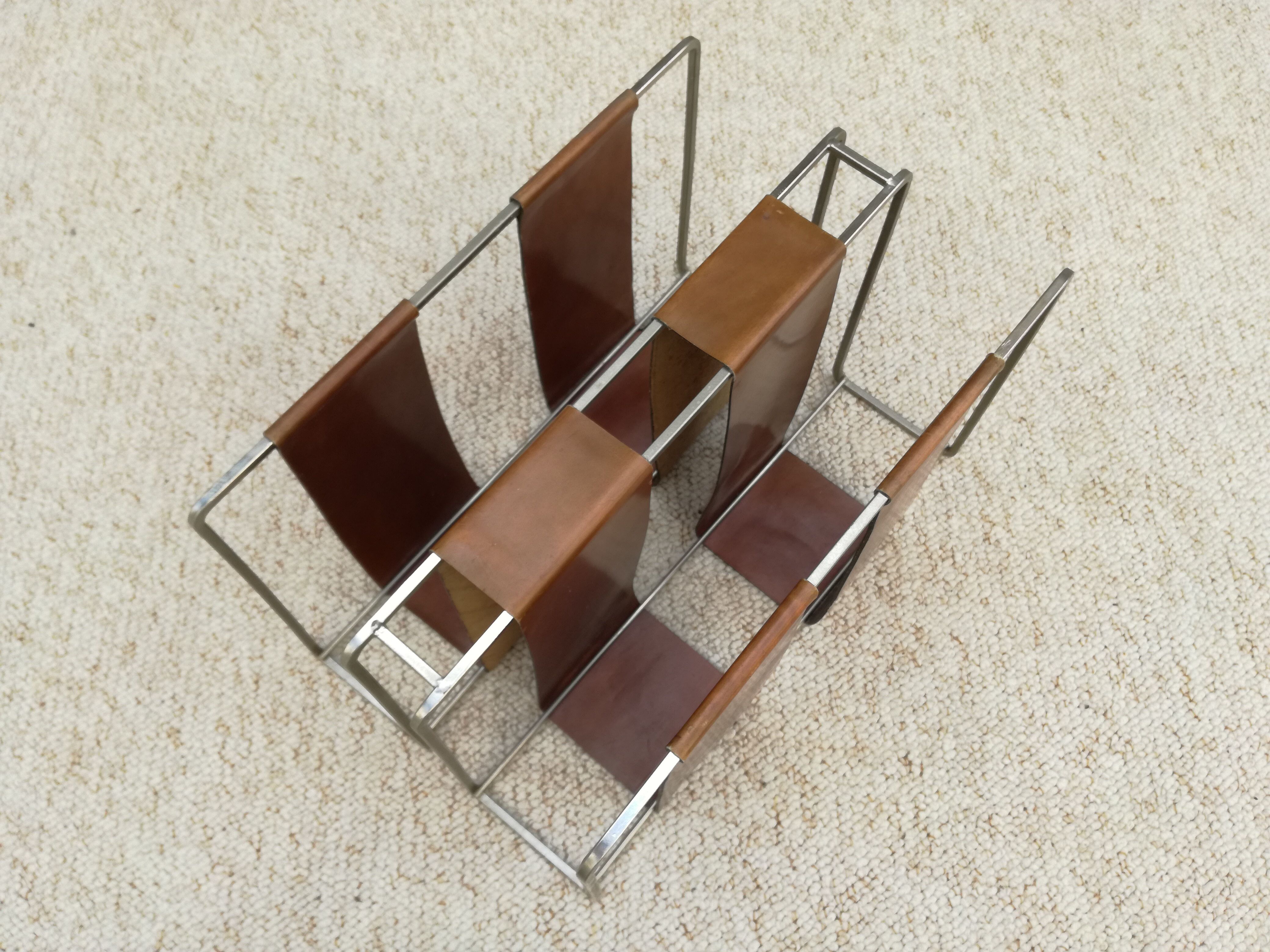 Minimalist metal and camel leather magazine holder