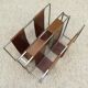 Minimalist metal and camel leather magazine holder
