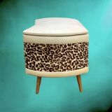 Vintage storage stool with compass legs in white faux leather and leopard velvet.