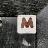 Jean-Claude Mahey mirror. Black lacquered wood and gold metal. 1970