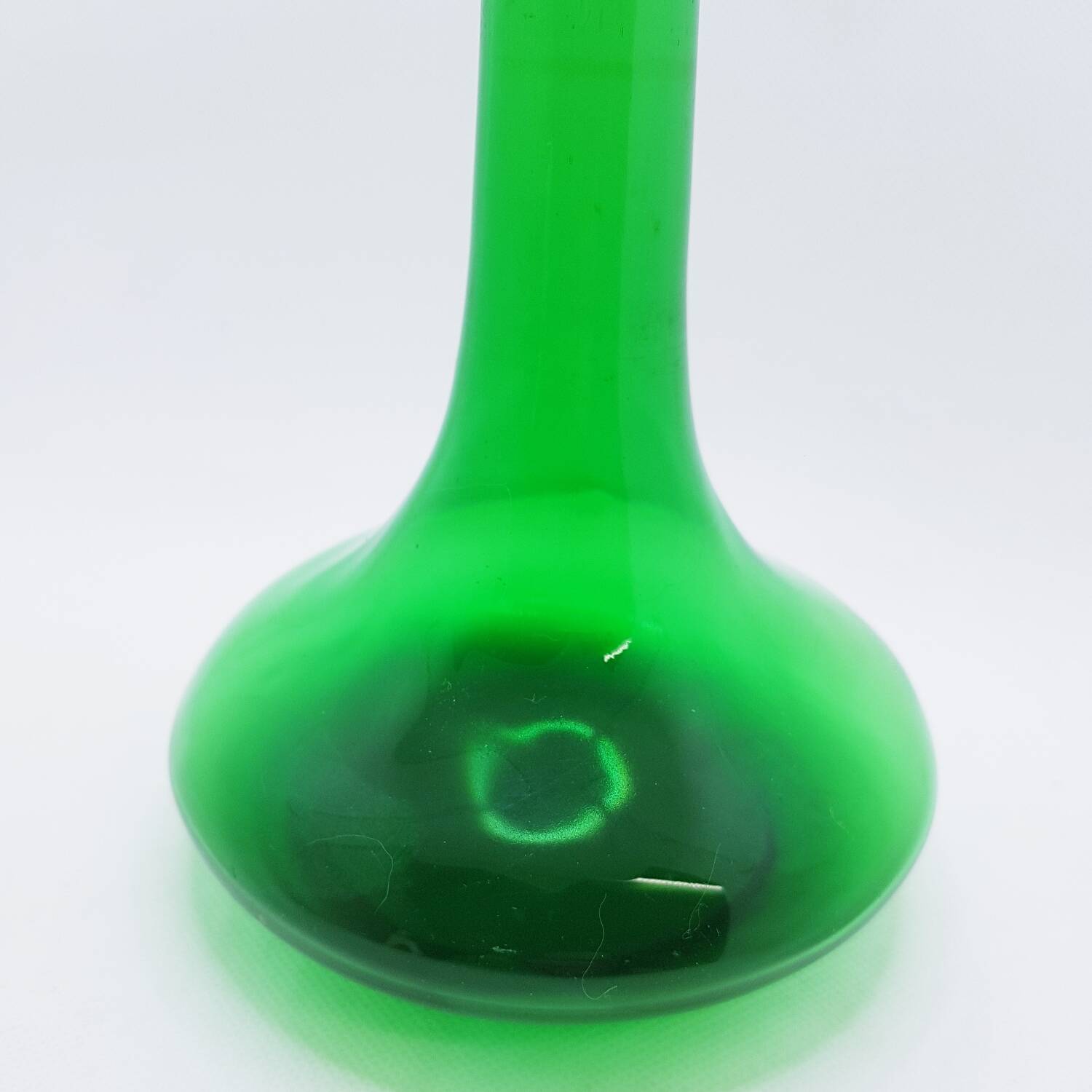 Tall green glass bud vase