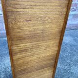 Sliding curtain binder cabinet