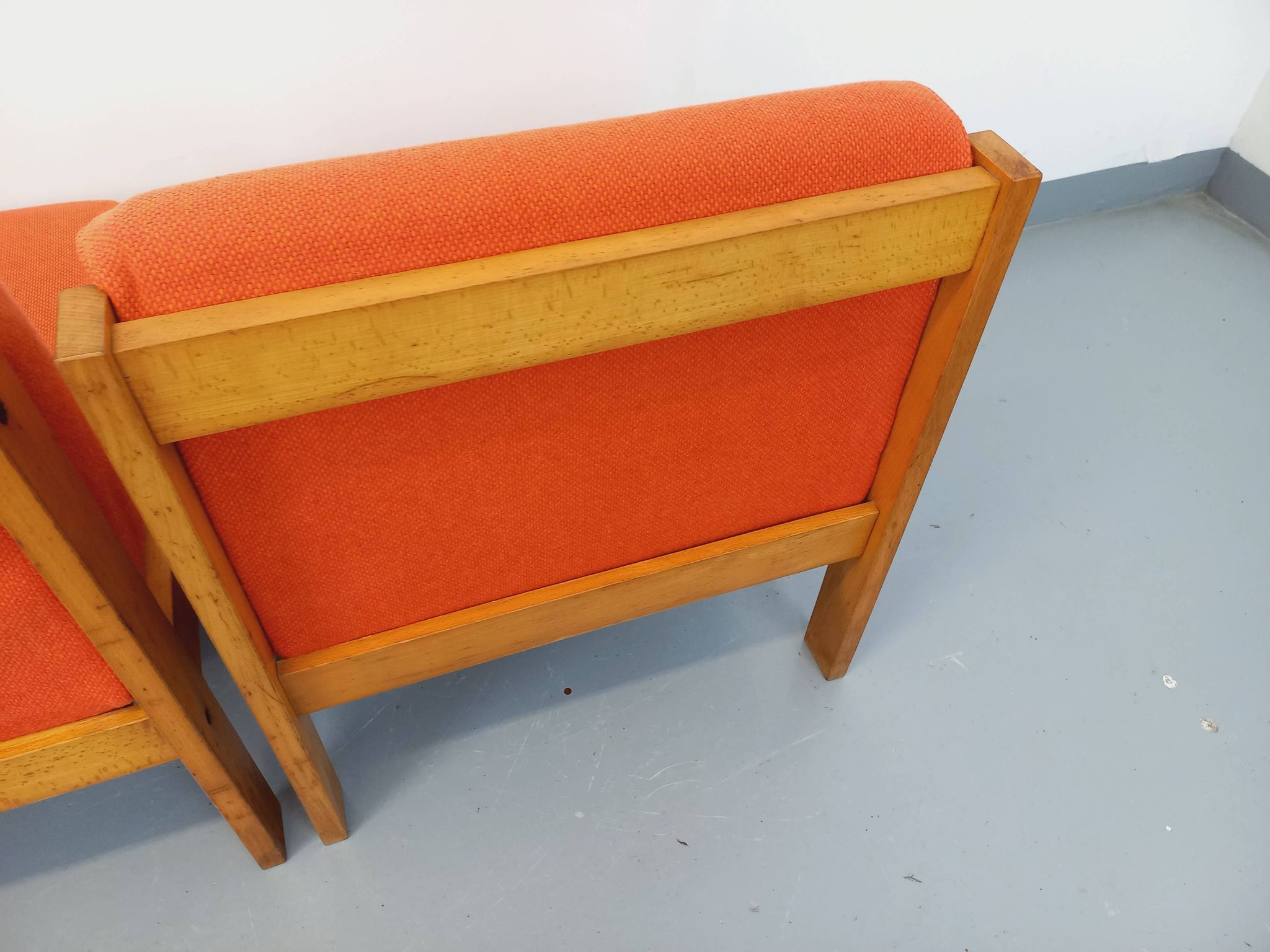 Set of 2 vintage Baumann armchairs in orange fabric and wood from the 80s