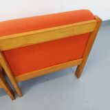 Set of 2 vintage Baumann armchairs in orange fabric and wood from the 80s