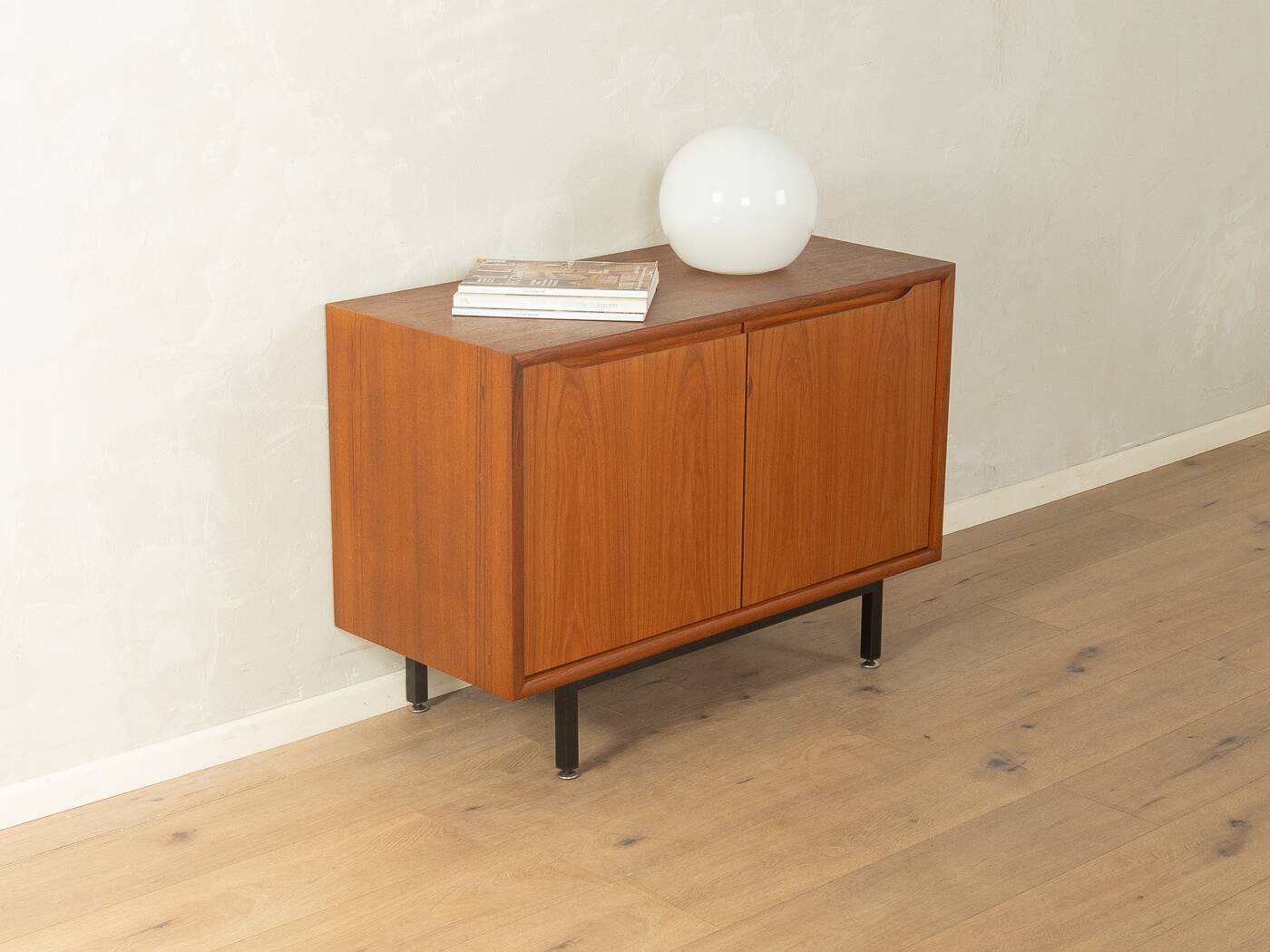 Classic chest of drawers from the 1960s with practical, closed storage space