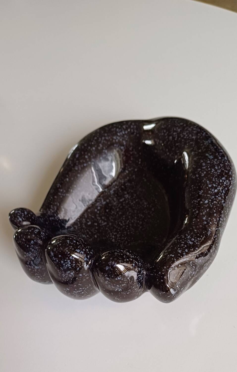 Ceramic hand emptier