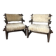 Set of 2 vintage wooden chairs with beige sheepskin seats, rustic style.