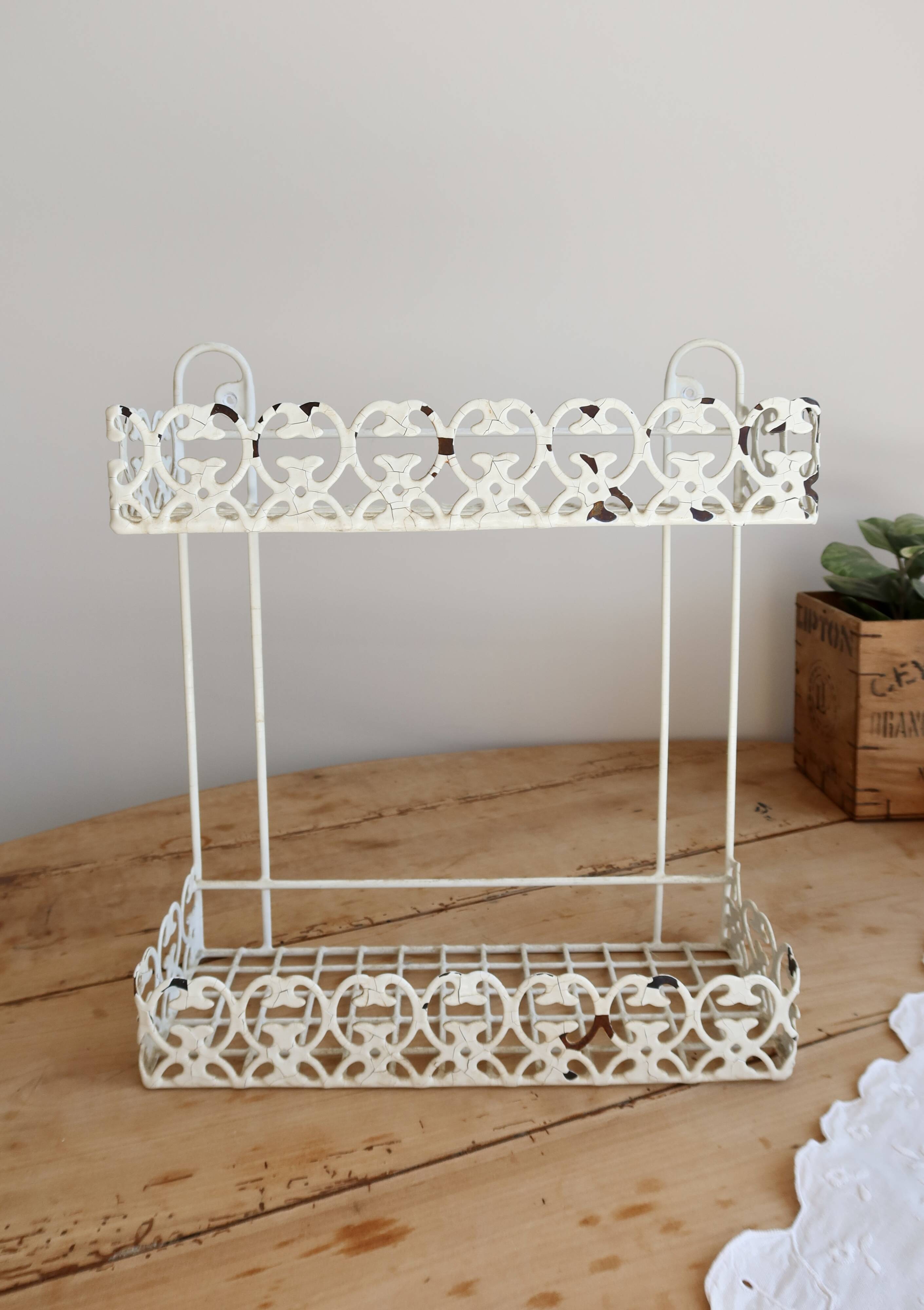 Vintage ivory patinated metal wall shelf