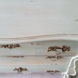 Curved patinated chest of drawers