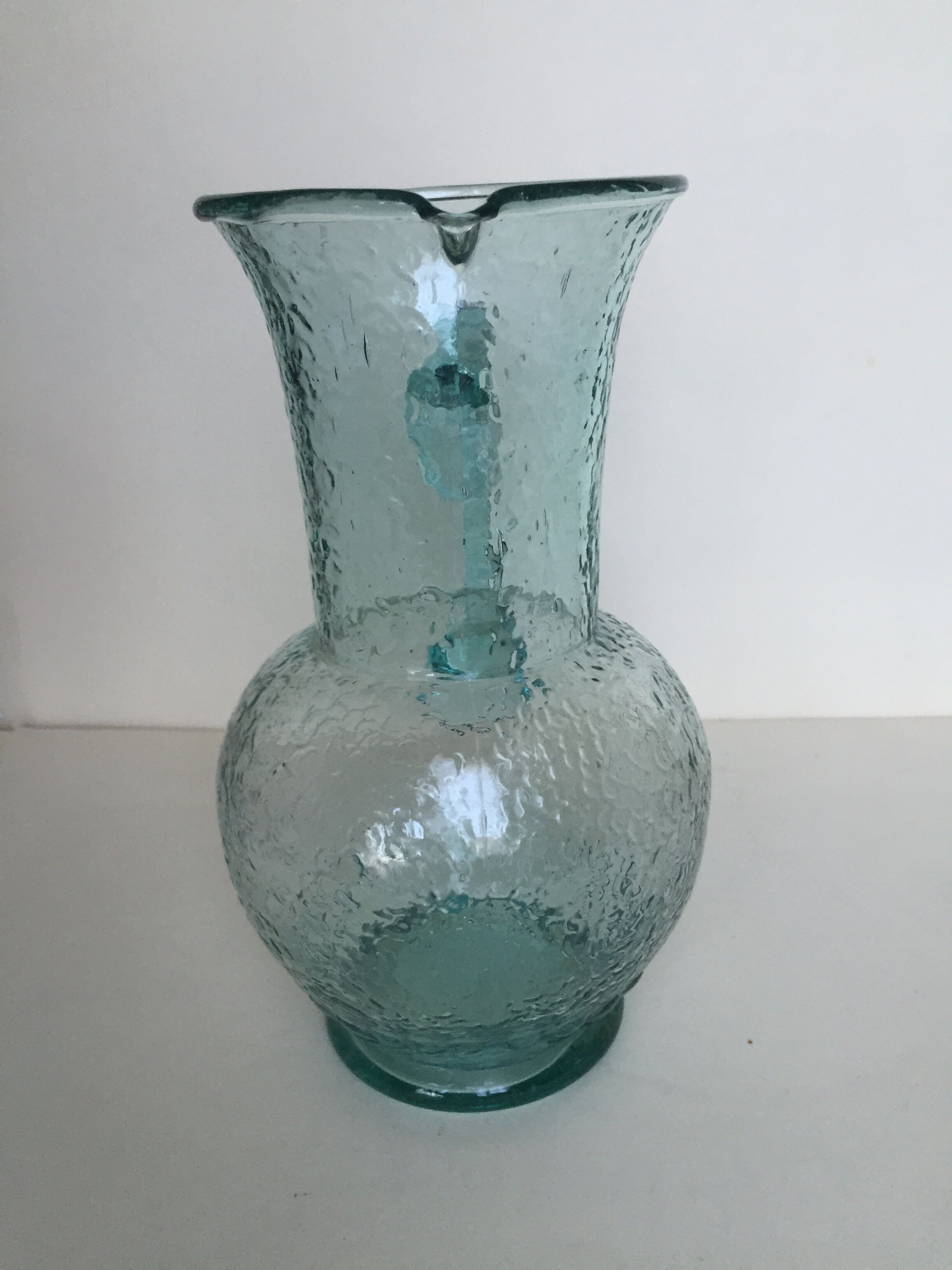 Green glass pitcher