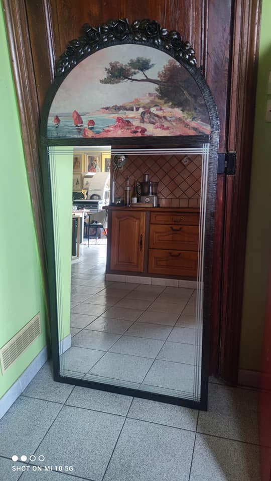 Overmantel mirror from the decorative arts period, 1929, in hammered wrought iron, 75x160cm
