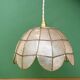 Vintage pendant light in mother-of-pearl and brass.