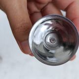 A set of 3 egg cups by Guy Degrenne.