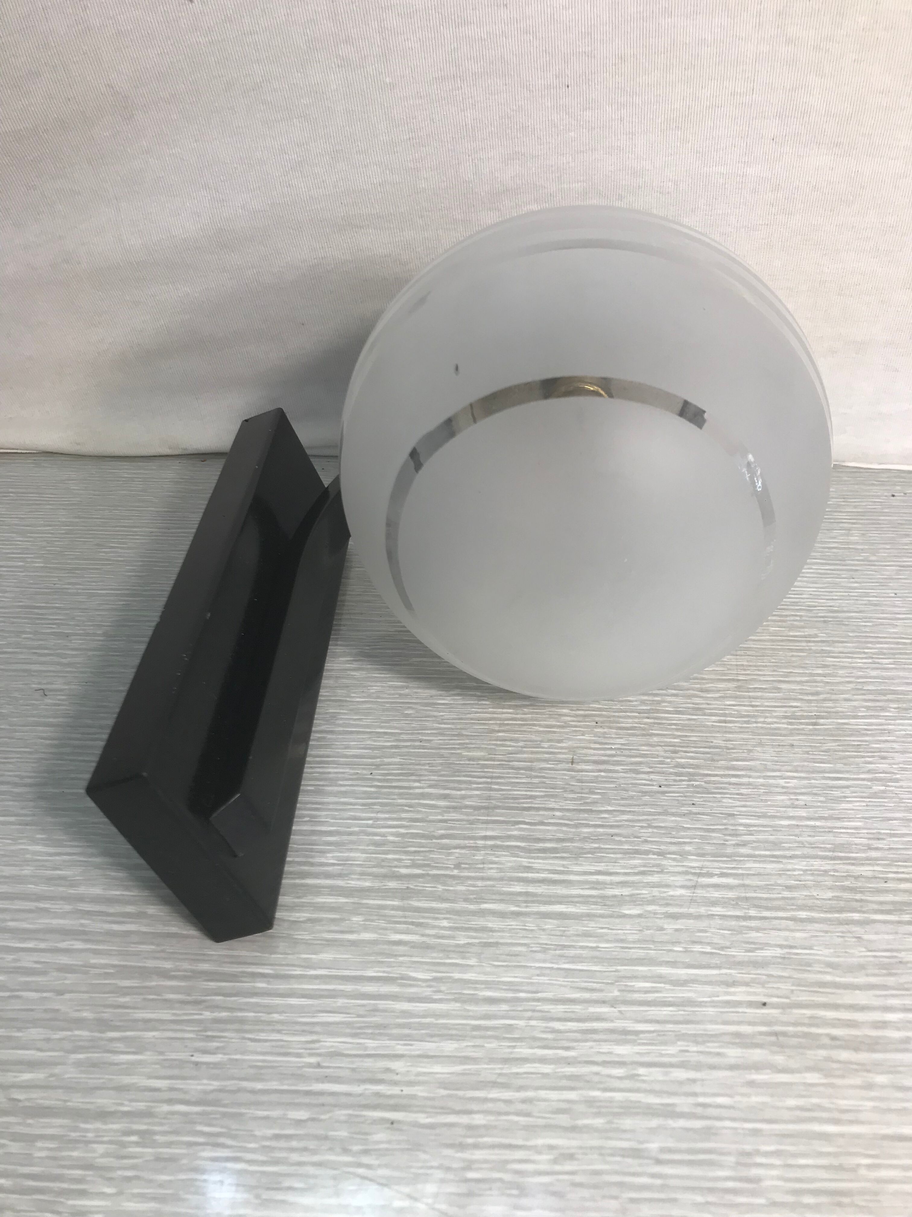 Vintage wall sconce ball-shaped glass reflector and black metal sconce