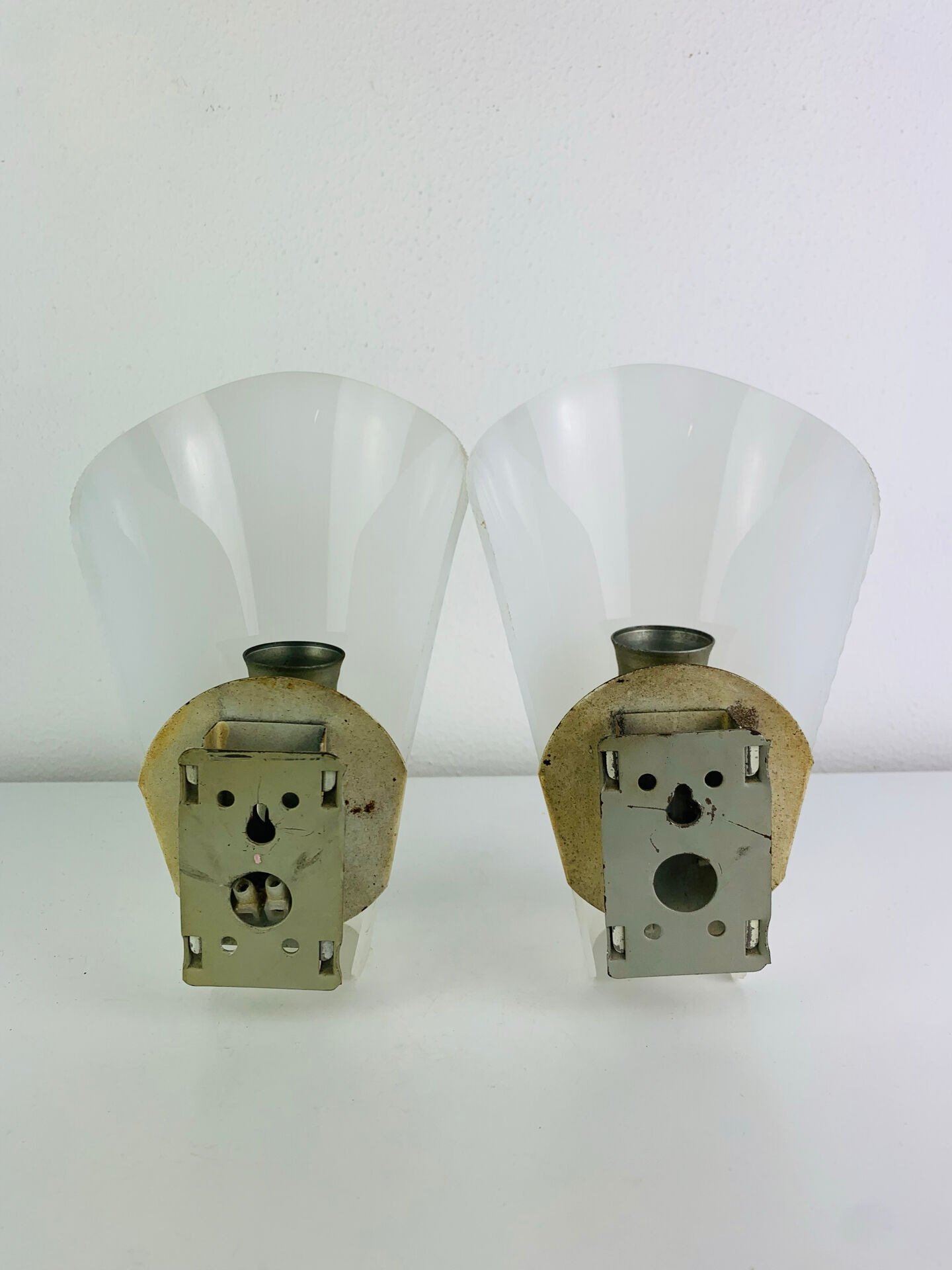Pair of 1950s striped plastic wall lights.