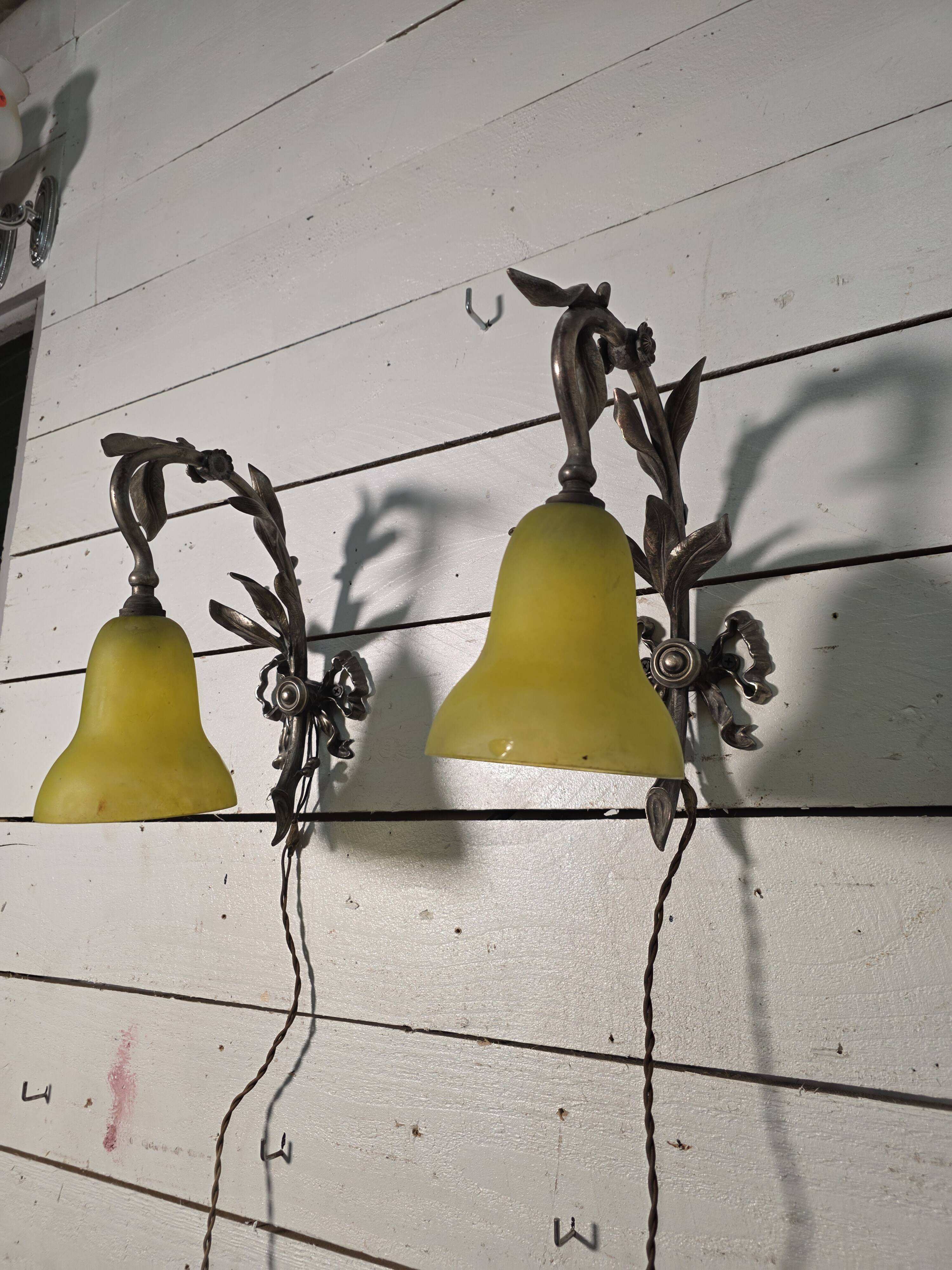 Pair of Louis XVI style bronze wall sconces