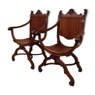 Paire de fauteuils anciens curules dit Dagobert en bois sculpté