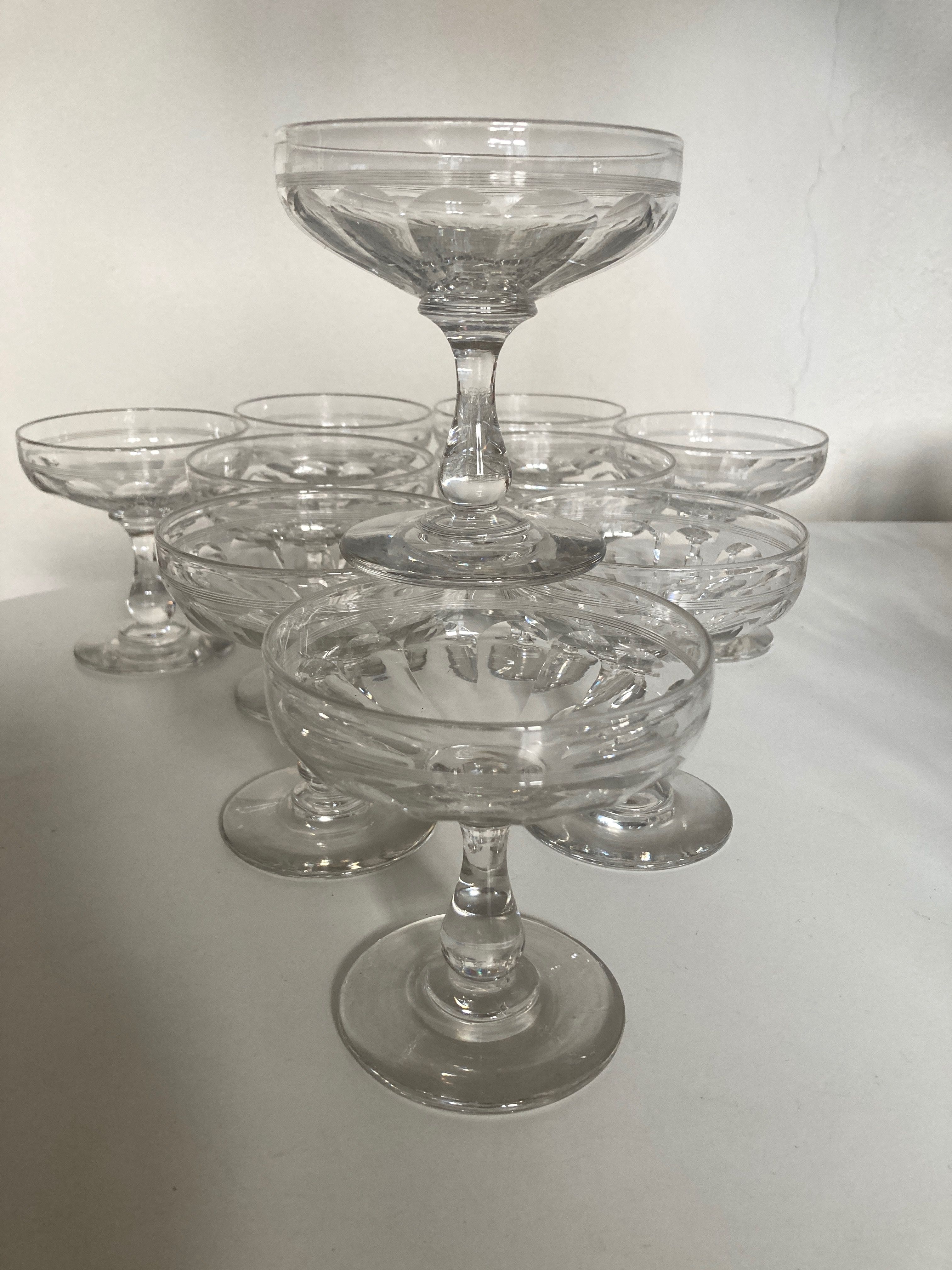 Set of 10 glasses of champagne 1870 in crystal ringing with flat ribs