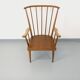 Vintage wooden armchair Baumann model Éventail from the 1960s.