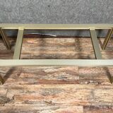Design coffee table in gilded metal and tinted glass