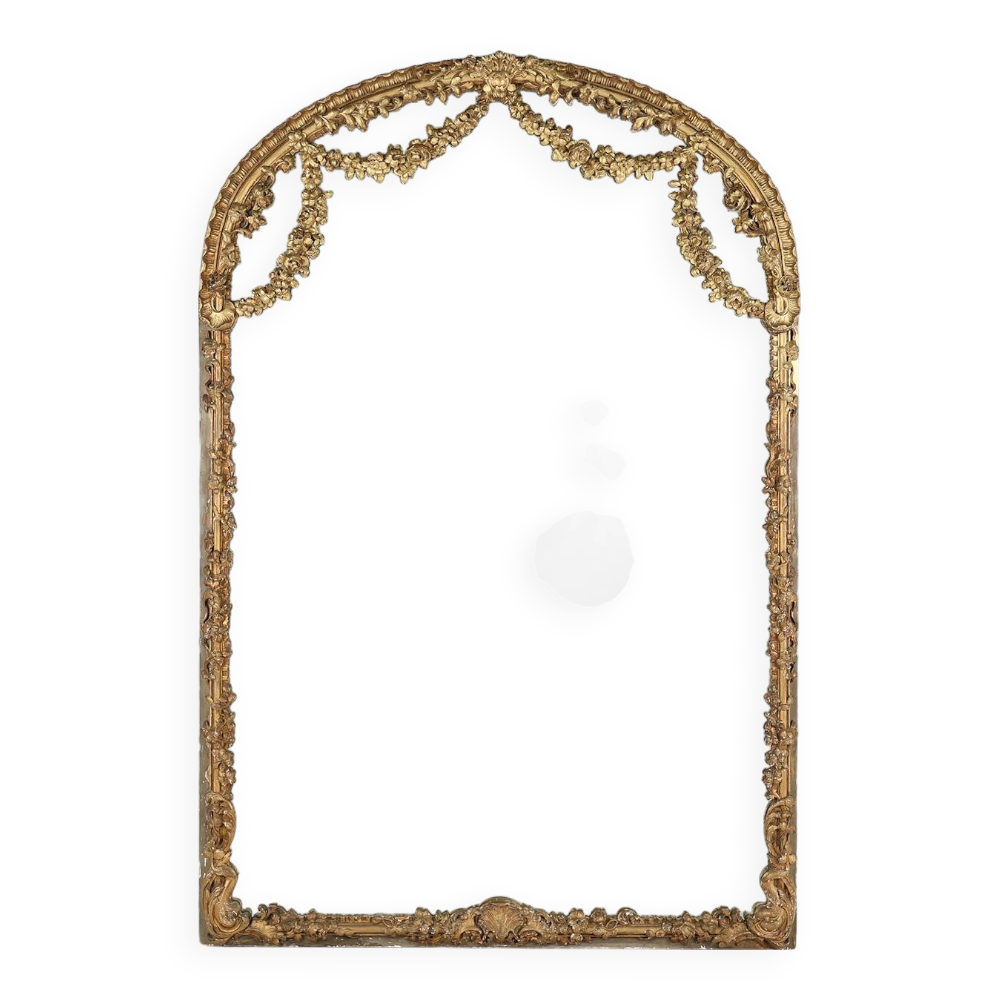 Large baroque decorated chimney mirror in gilted wood, France ca. 1800