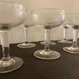 6 champagne glasses in antique glass, blown and engraved