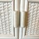 Rattan wall shelf