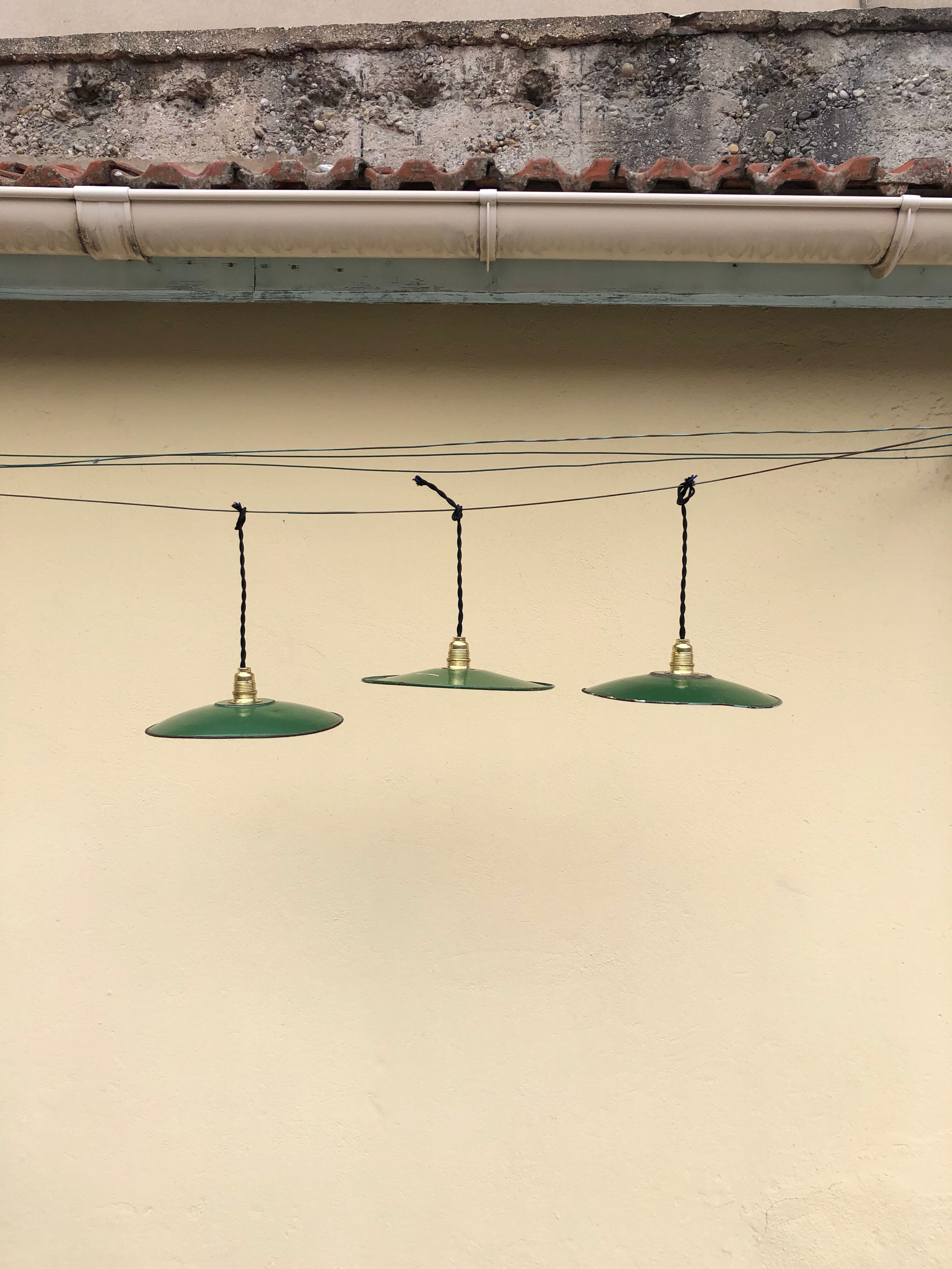 Trio in white green enamelled sheet hanging lamps