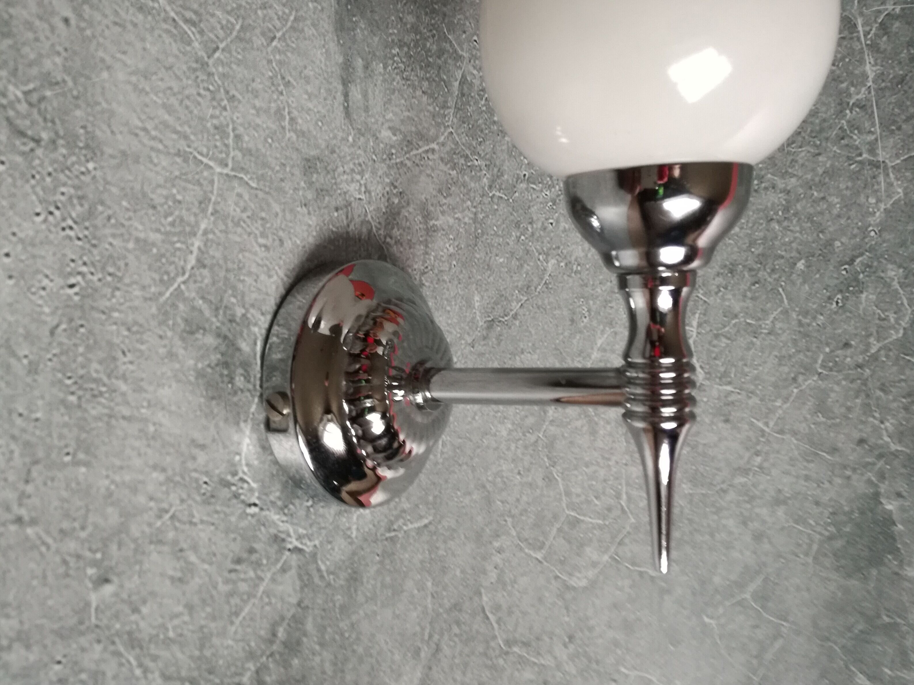 Mismatched sconces 1950