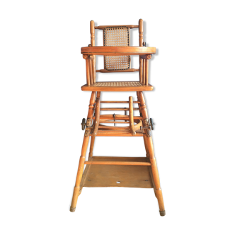 Chaise haute de bébé ancienne en bois et cannage