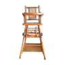 Old baby high chair in wood and caning