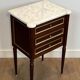 Pair of mahogany and brass side tables or bedside tables with Carrara marble tops.