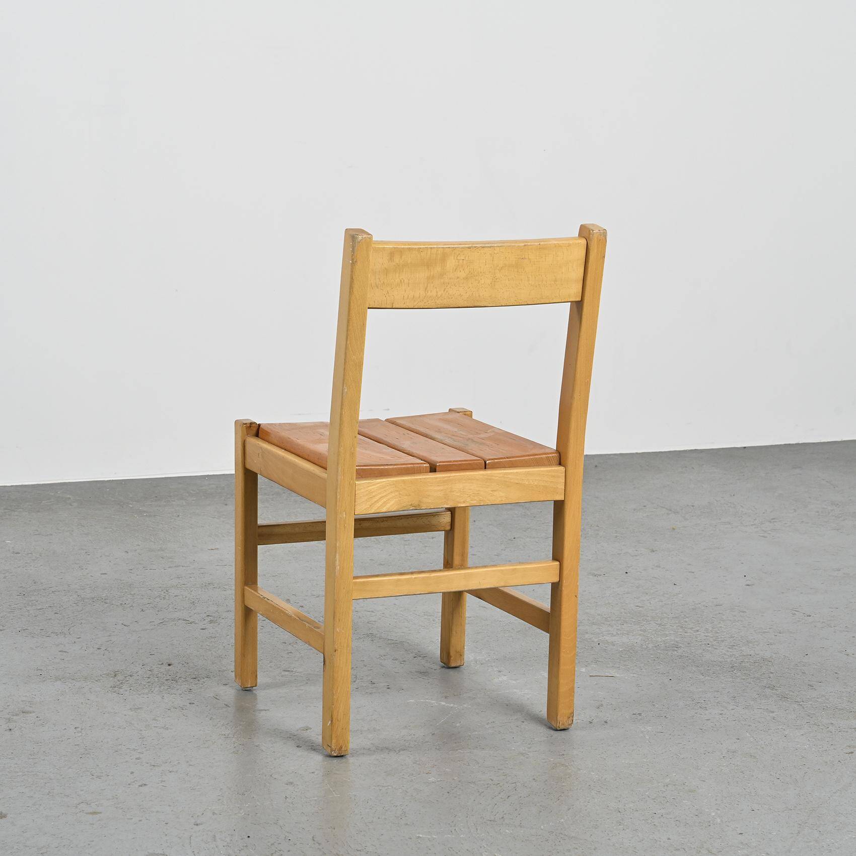 Suite of four chairs in the style of Maison Regain