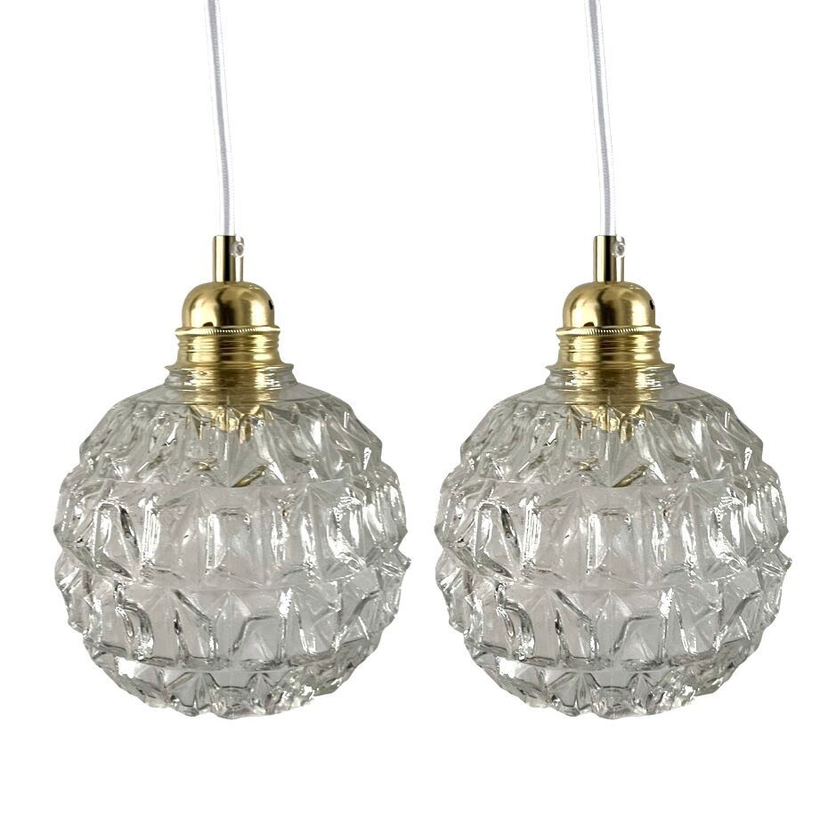 Set of two vintage electrified glass pendant lamps