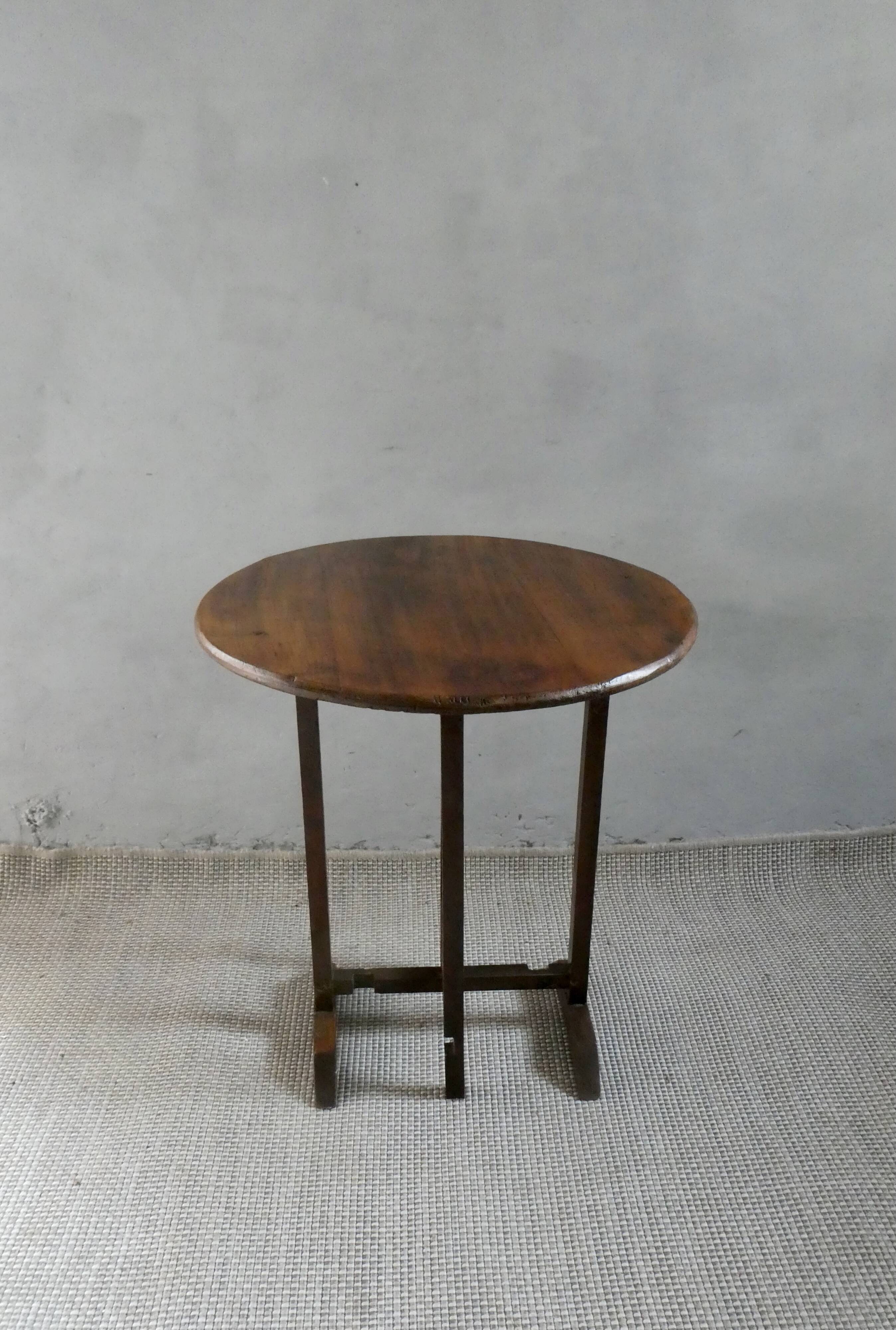 Small table known as a winemaker's table.