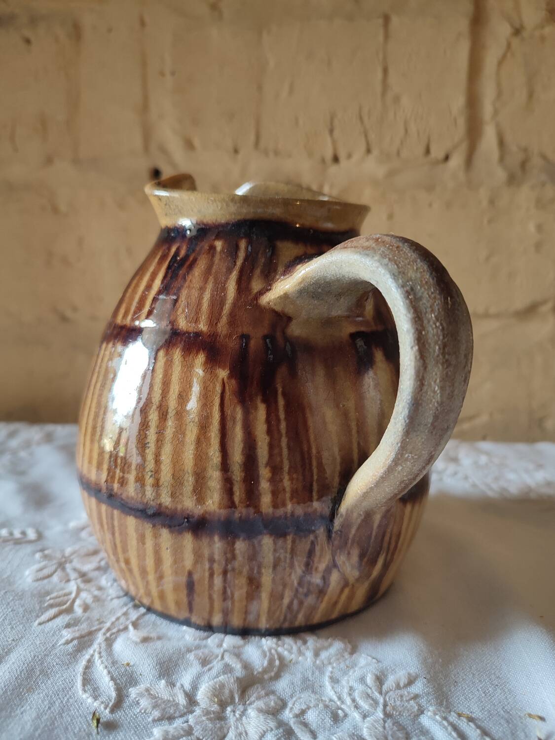 Old sandstone pitcher vase