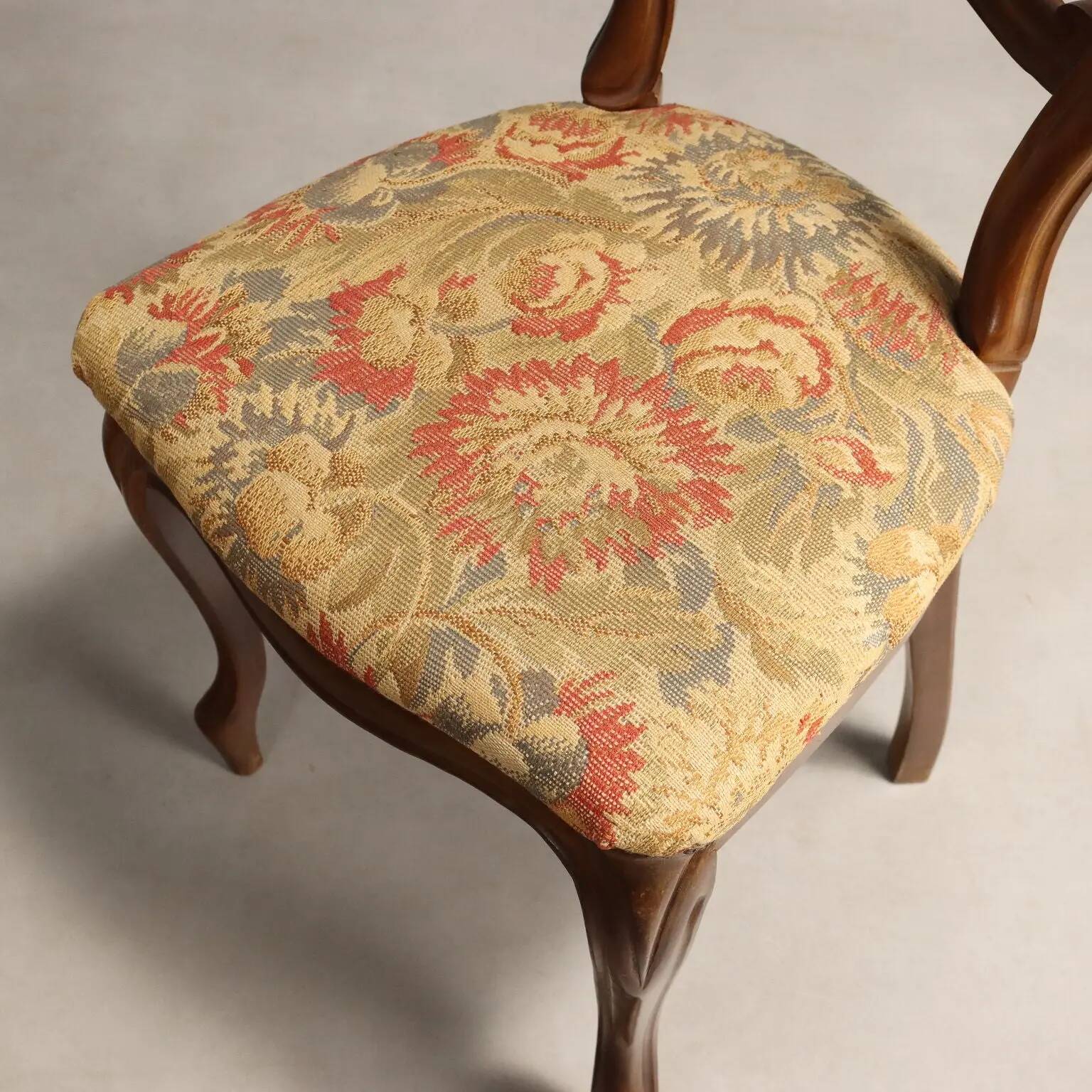 Pair of antique Louis-Philippe chairs in walnut and fabric, Italy, 19th century.