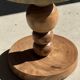 Coffee table in solid suar with central leg and spheres H56.5 D55.5